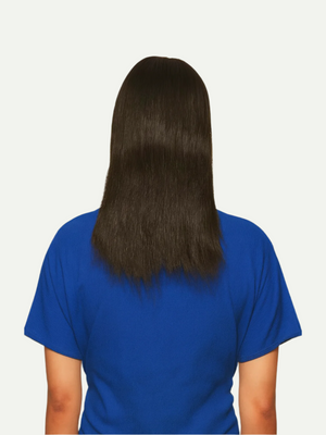 Person wearing a blue shirt with long, dark hair on a plain background