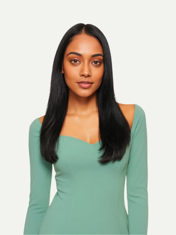 Woman wearing a green dress against a white background